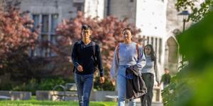 Two students walking to class together